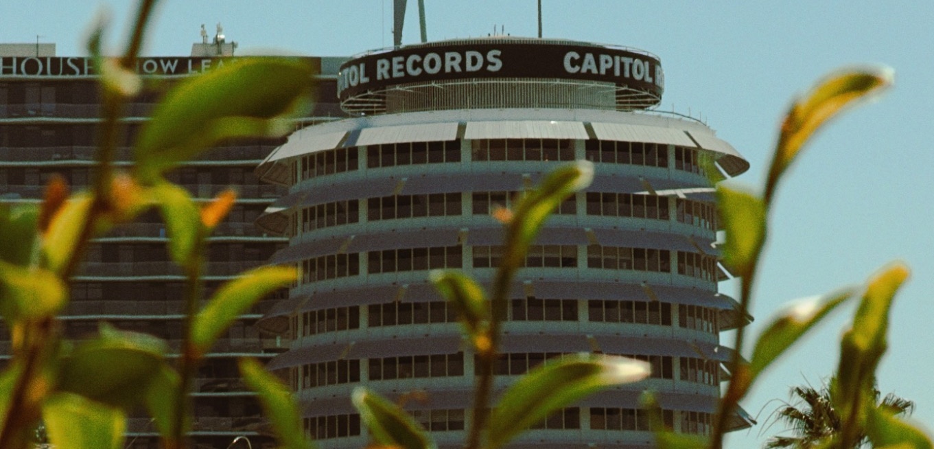 Capitol Records building framed through plants